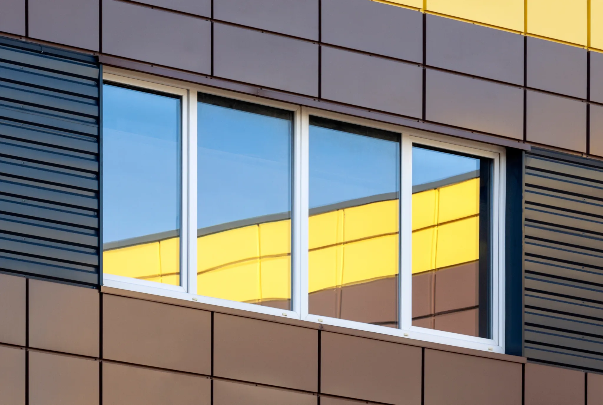 abstract-modern-building-exterior-with-colorful-wi-2025-01-09-02-07-26-utc 1