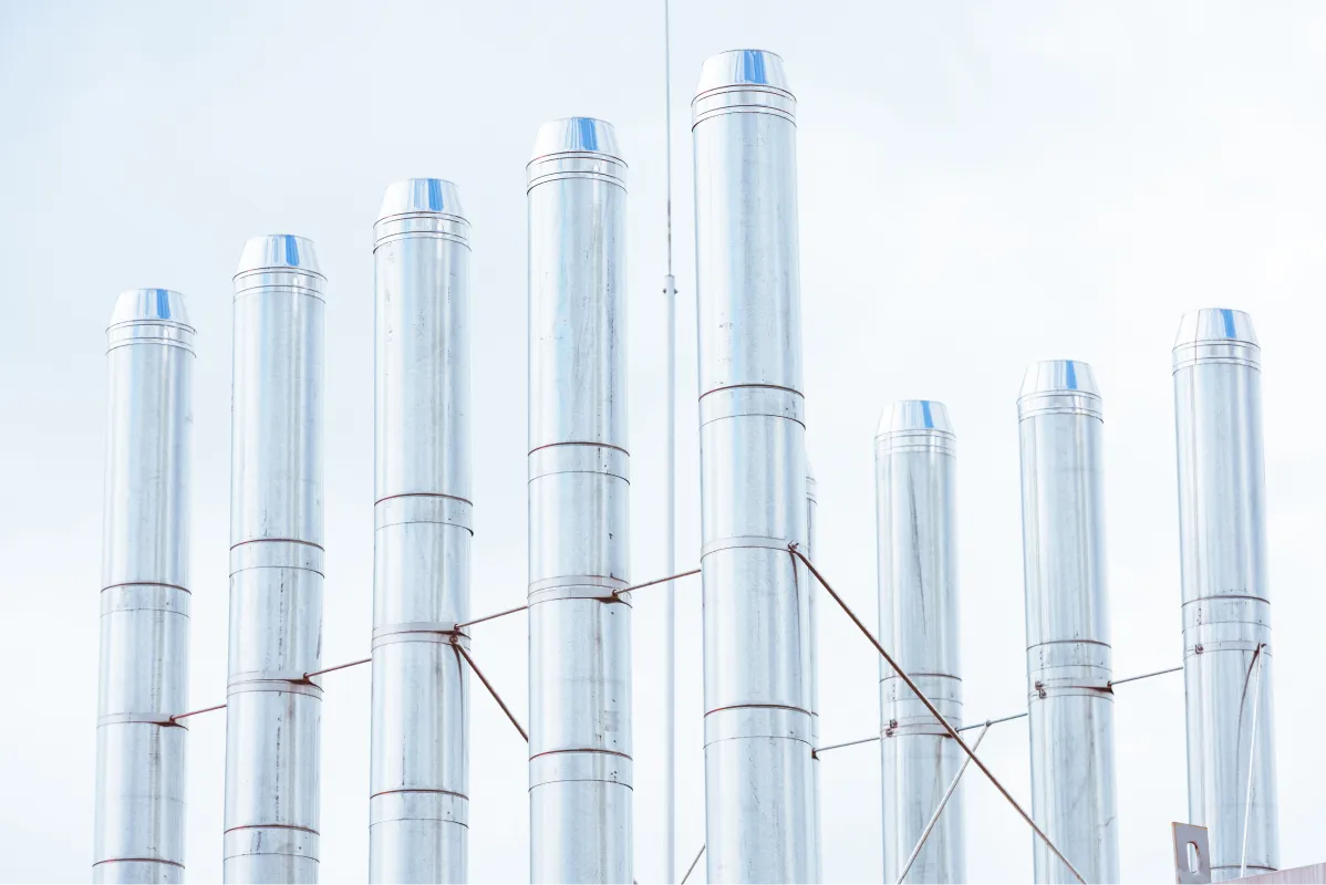 industrial-pipes-on-light-sky-background-2024-11-19-13-50-01-utc 1